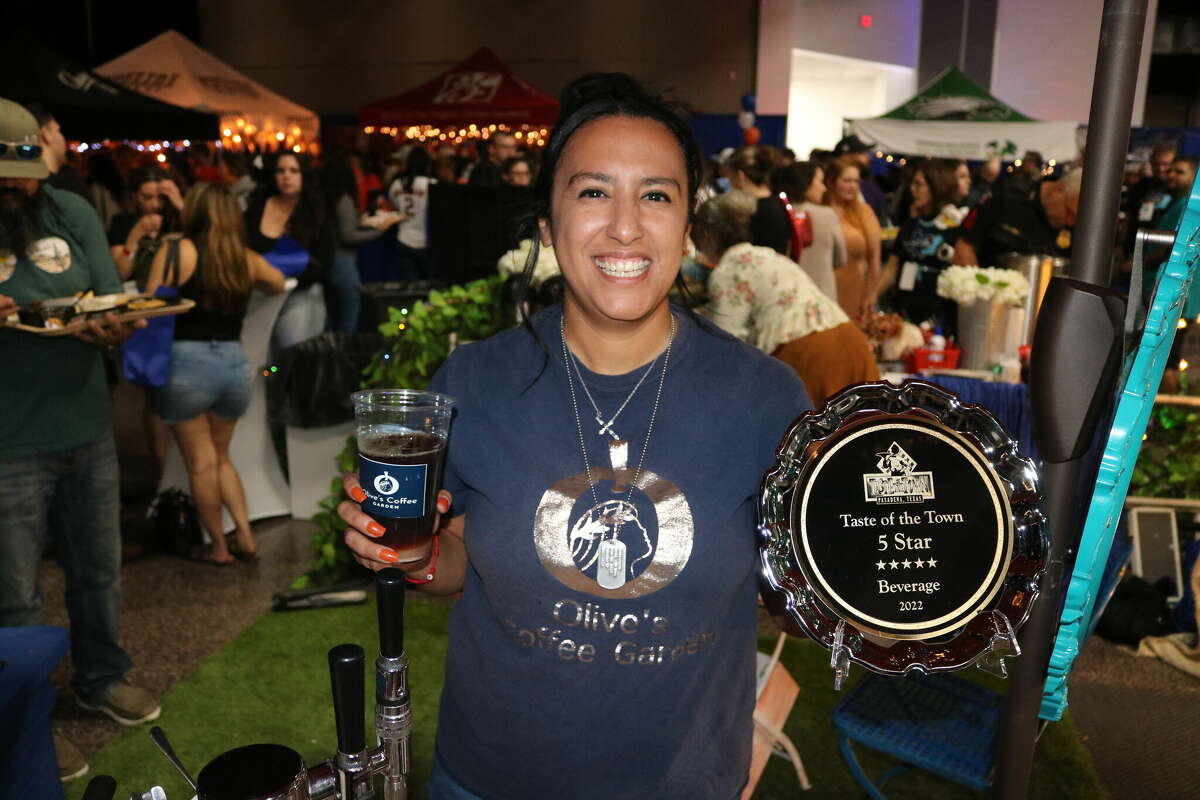 Olivia Paredes-Tolliver, owner of Olives Coffee Garden, has a big smile after winning the Beverage Division at Pasadena Chamber of Commerce's Taste of the Town.