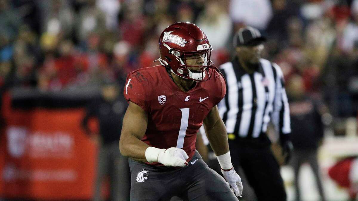 Washington State linebacker Daiyan Henley follows a play during the second half of an NCAA college football game against Utah, Thursday, Oct. 27, 2022, in Pullman, Wash. (AP Photo/Young Kwak)