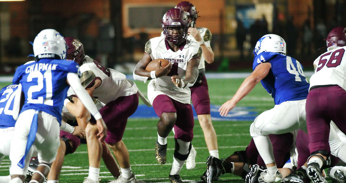 Magnolia West's Terry Daniels (4) finds a hole in the Friendswood defense Friday, Nov. 4, 2022 at Friendswood High School.