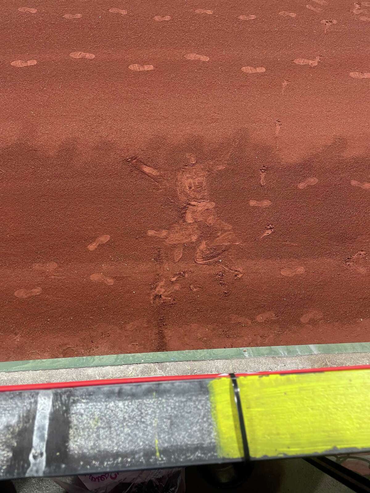 Astros fan who took the Chas McCormick dirt imprint photo