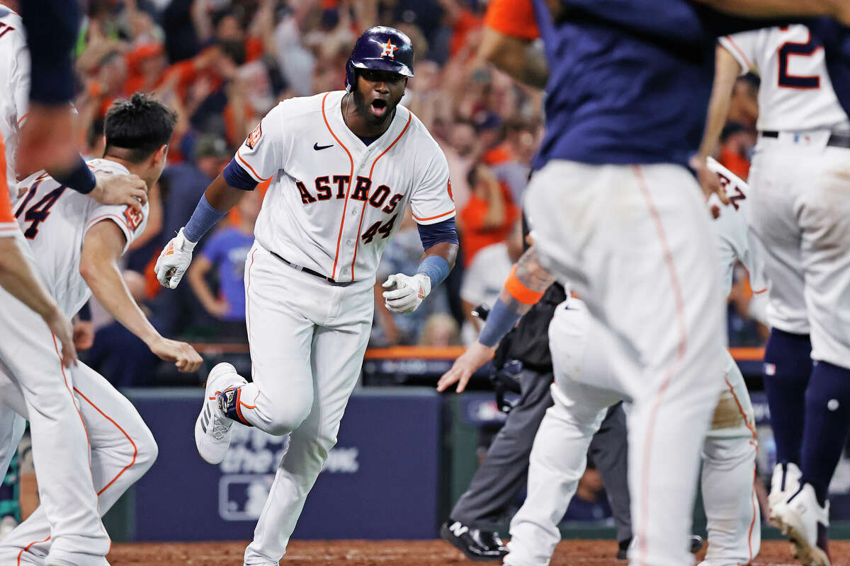 Yordan Alvarez #44 of the Houston Astros celebrates after hitting a walk-off home run against the Seattle Mariners during the ninth inning in game one of the American League Division Series at Minute Maid Park on October 11, 2022 in Houston.
