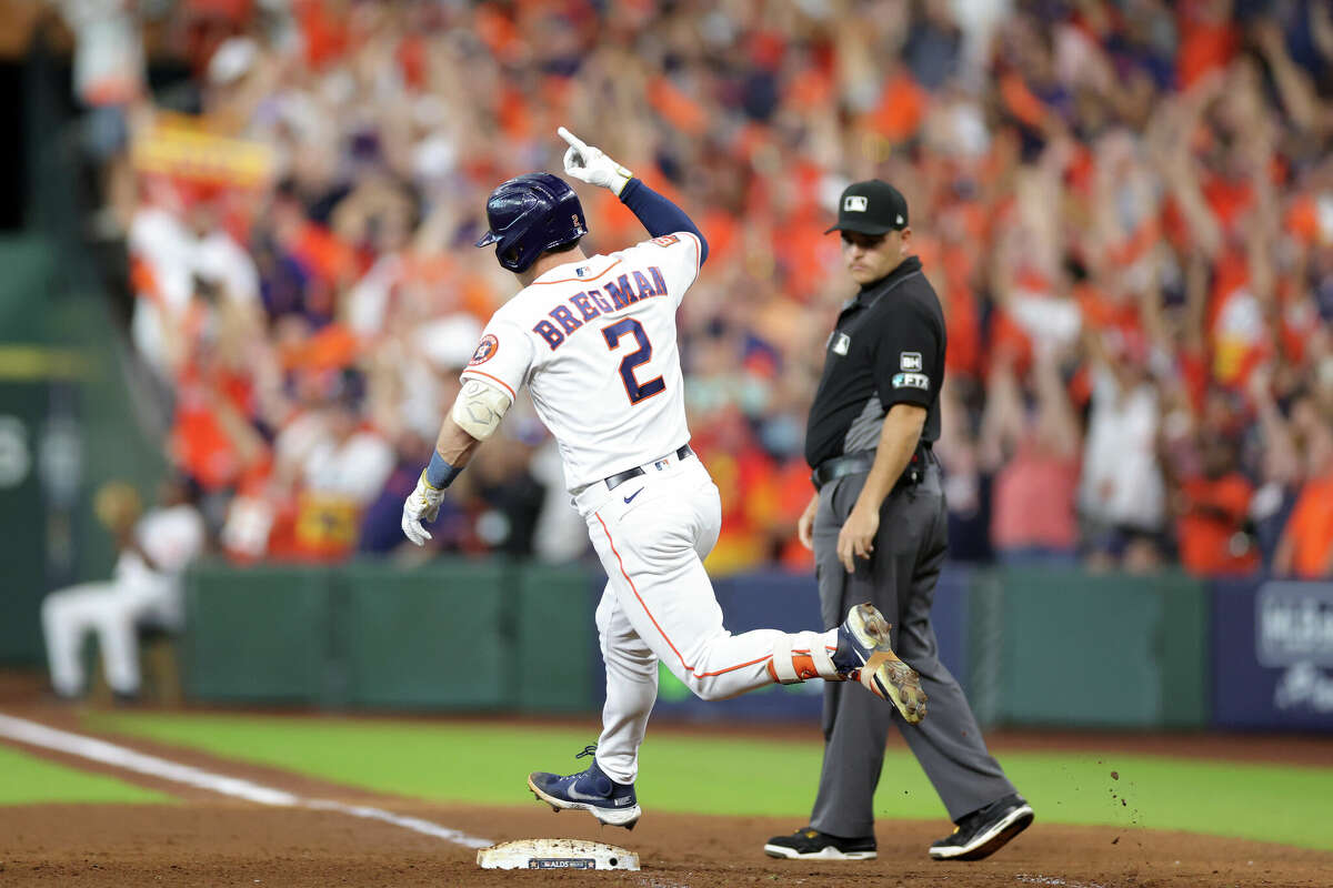 Alex Bregman #2 of the Houston Astros jogs around the bases after hitting a two-run home run against the Seattle Mariners during the eighth inning in game one of the American League Division Series at Minute Maid Park on October 11, 2022 in Houston.