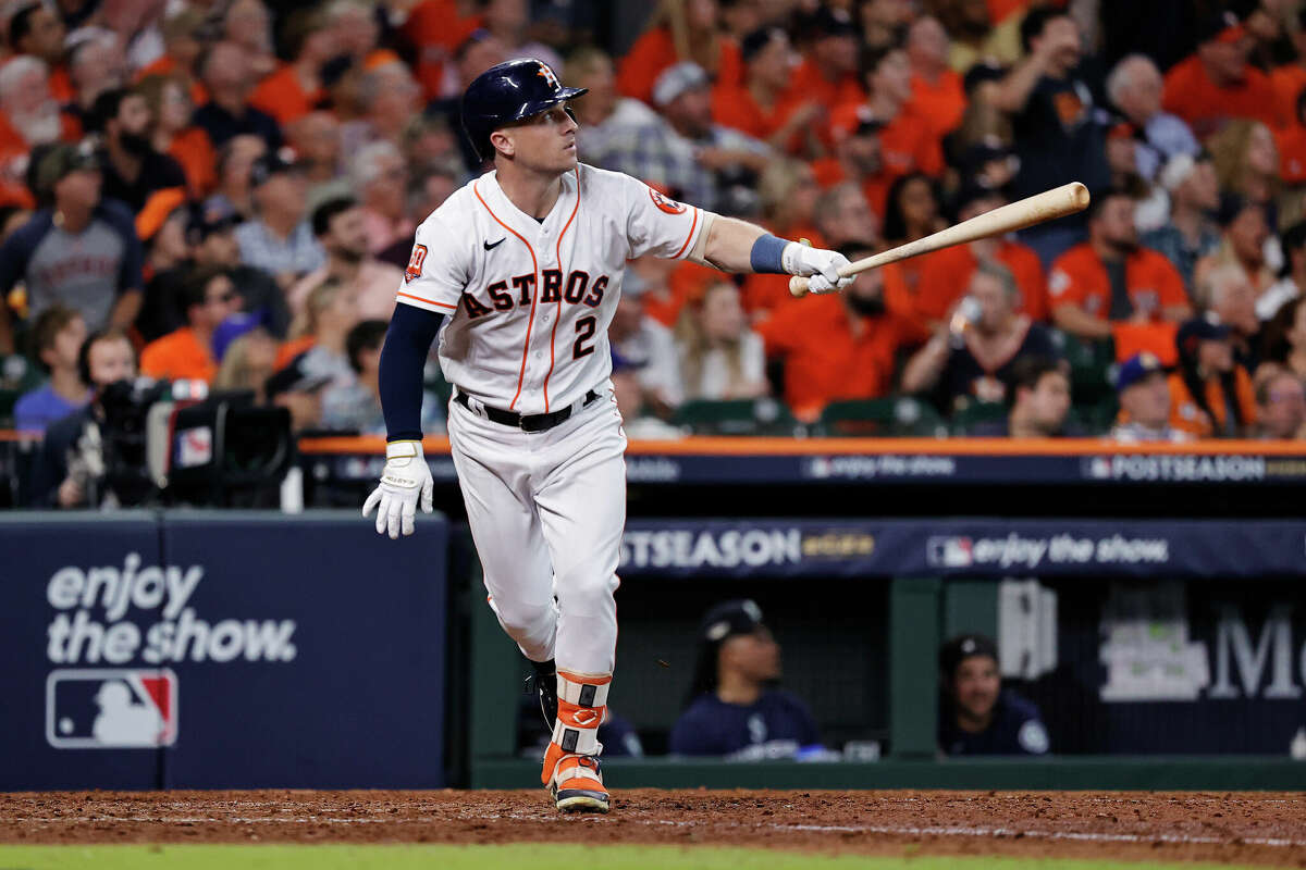 Alex Bregman #2 of the Houston Astros hits a two-run home run against the Seattle Mariners during the eighth inning in game one of the American League Division Series at Minute Maid Park on October 11, 2022 in Houston.