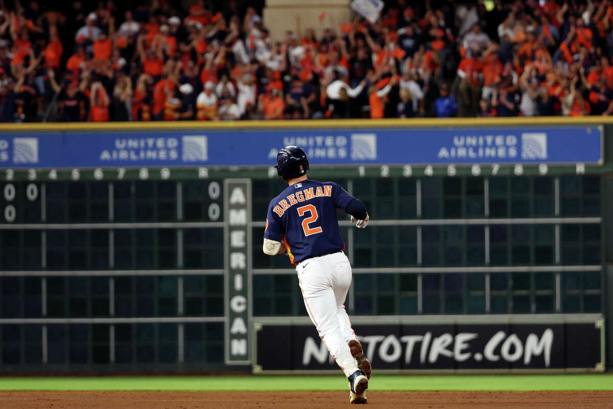 Alex Bregman #2 of the Houston Astros rounds the bases after hitting a three-run home run in the third inning during Game 2 of the ALCS between the New York Yankees and the Houston Astros at Minute Maid Park on Thursday, October 20, 2022 in Houston.