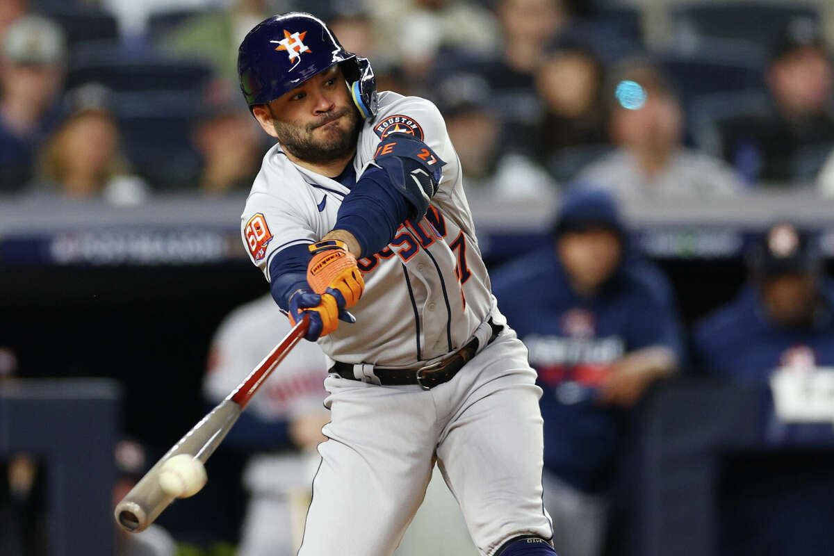 Jose Altuve #27 of the Houston Astros hits a double against the New York Yankees during the fifth inning in game three of the American League Championship Series at Yankee Stadium on October 22, 2022 in New York City.