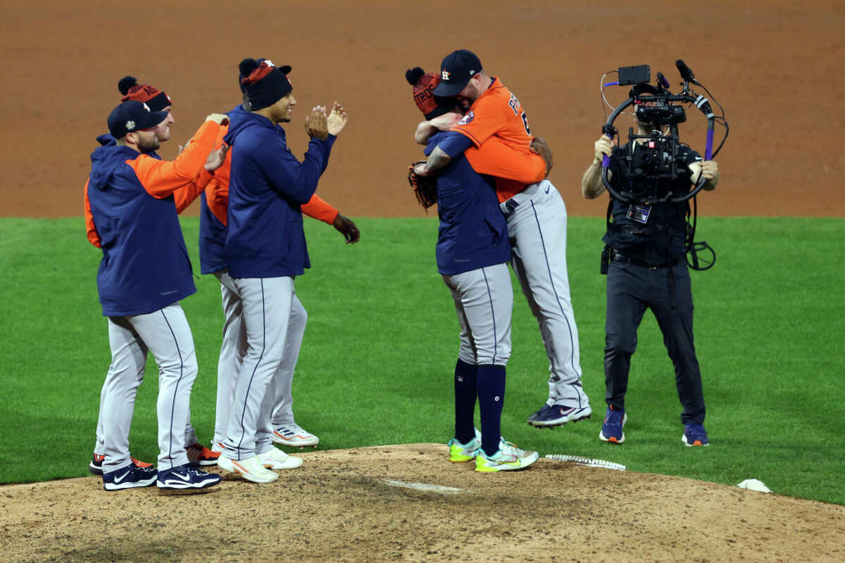 Cristian Javier #53 and Ryan Pressly #55 of the Houston Astros celebrate after defeating the Philadelphia Phillies 5-0 in a combined no-hitter in Game Four of the 2022 World Series at Citizens Bank Park on November 02, 2022 in Philadelphia, Pennsylvania.