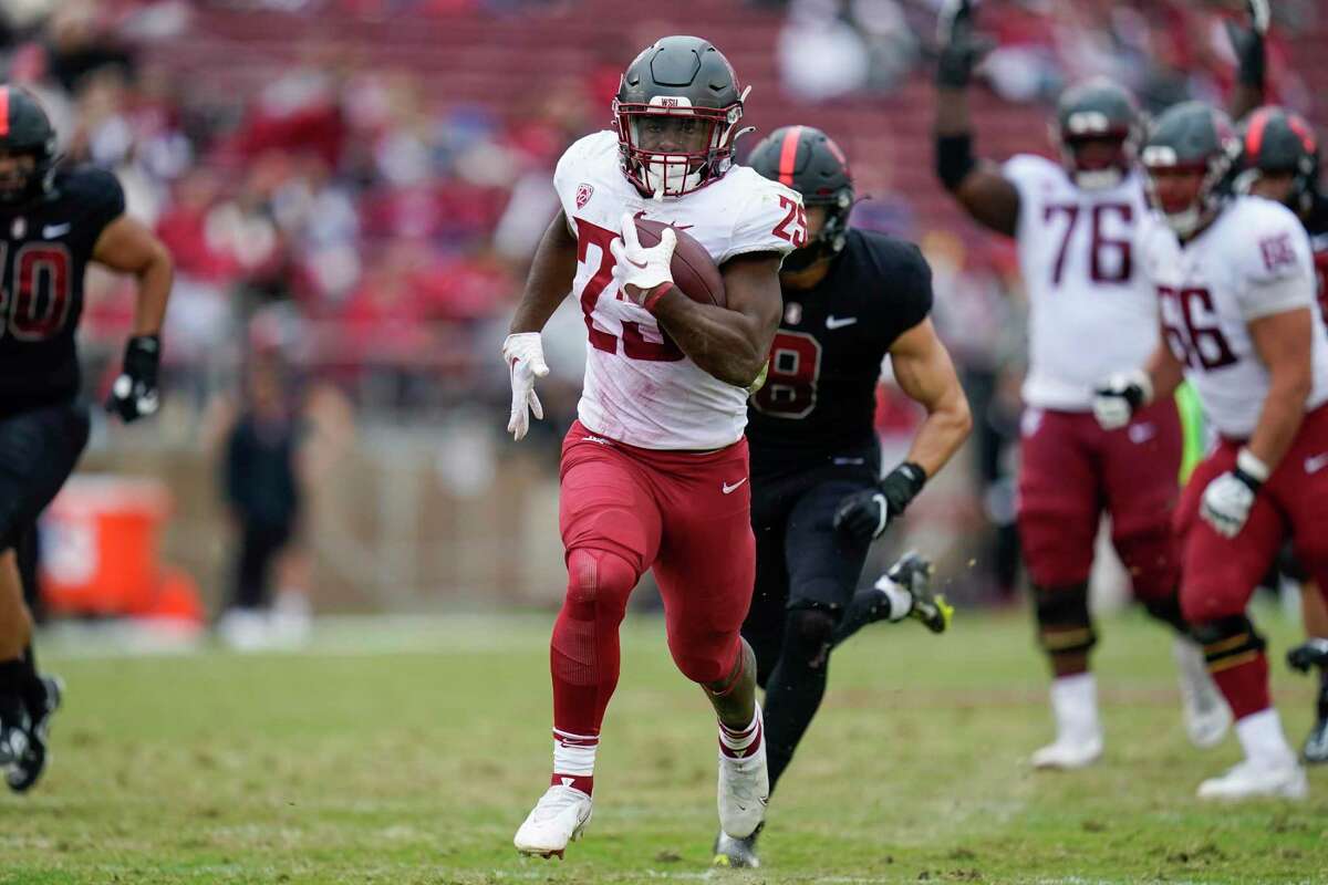 Washington State running back Nakia Watson (25) runs for a 41-yard touchdown against Stanford during the first half of an NCAA college football game in Stanford, Calif., Saturday, Nov. 5, 2022. (AP Photo/Godofredo A. Vásquez)