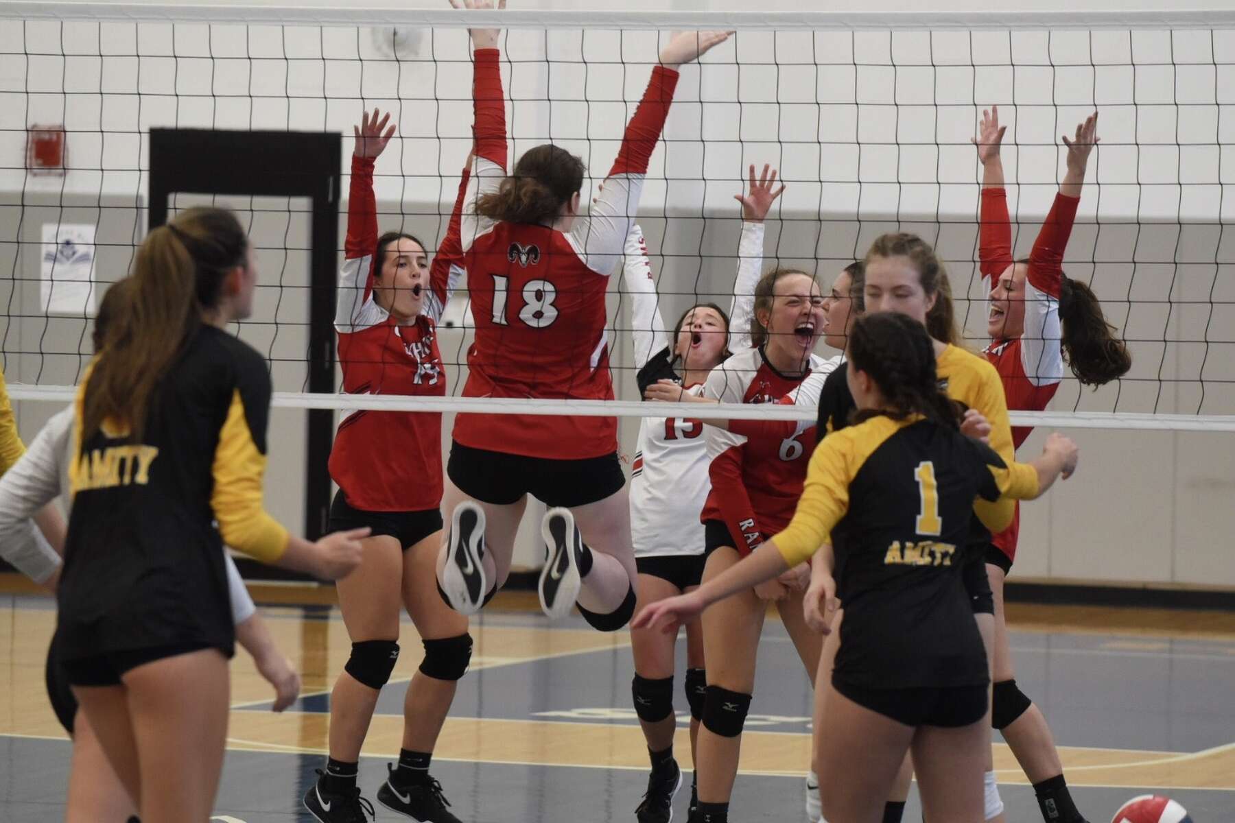 Cheshire beats Amity to win 16th SCC girls volleyball title.