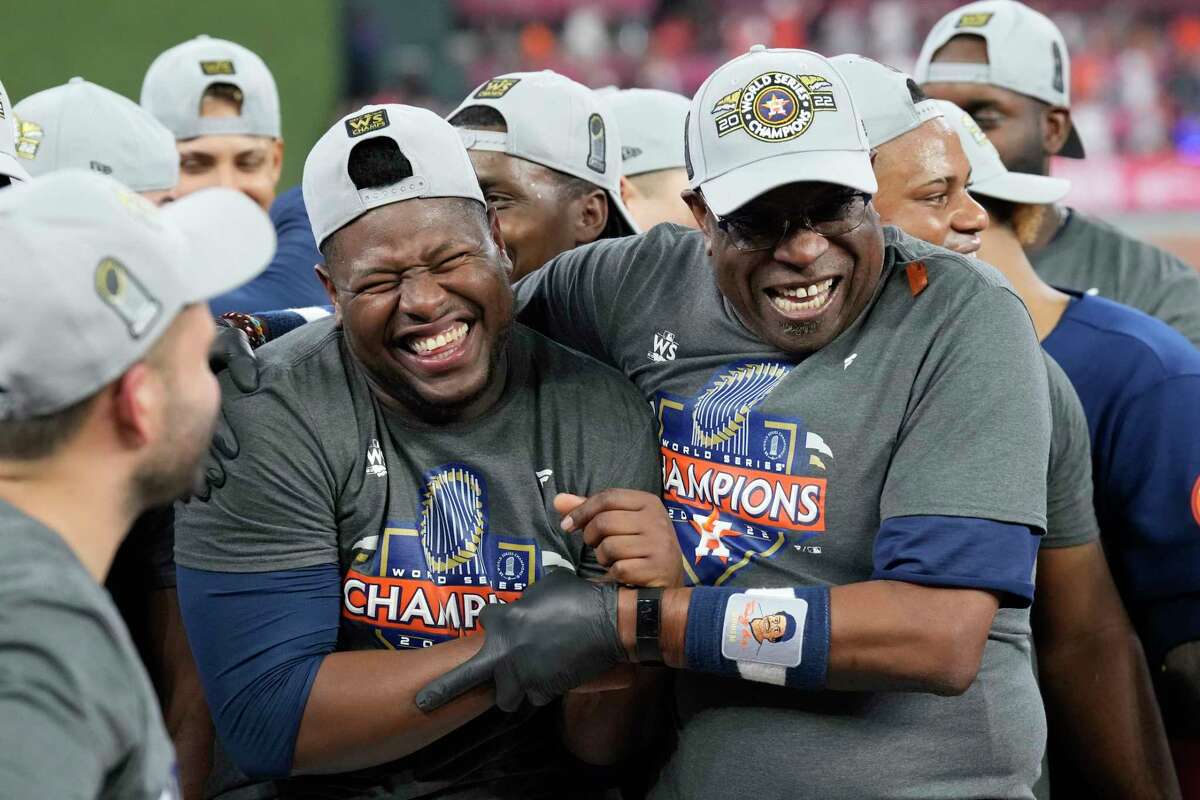 Darren Baker celebrates dad Dusty's World Series victory