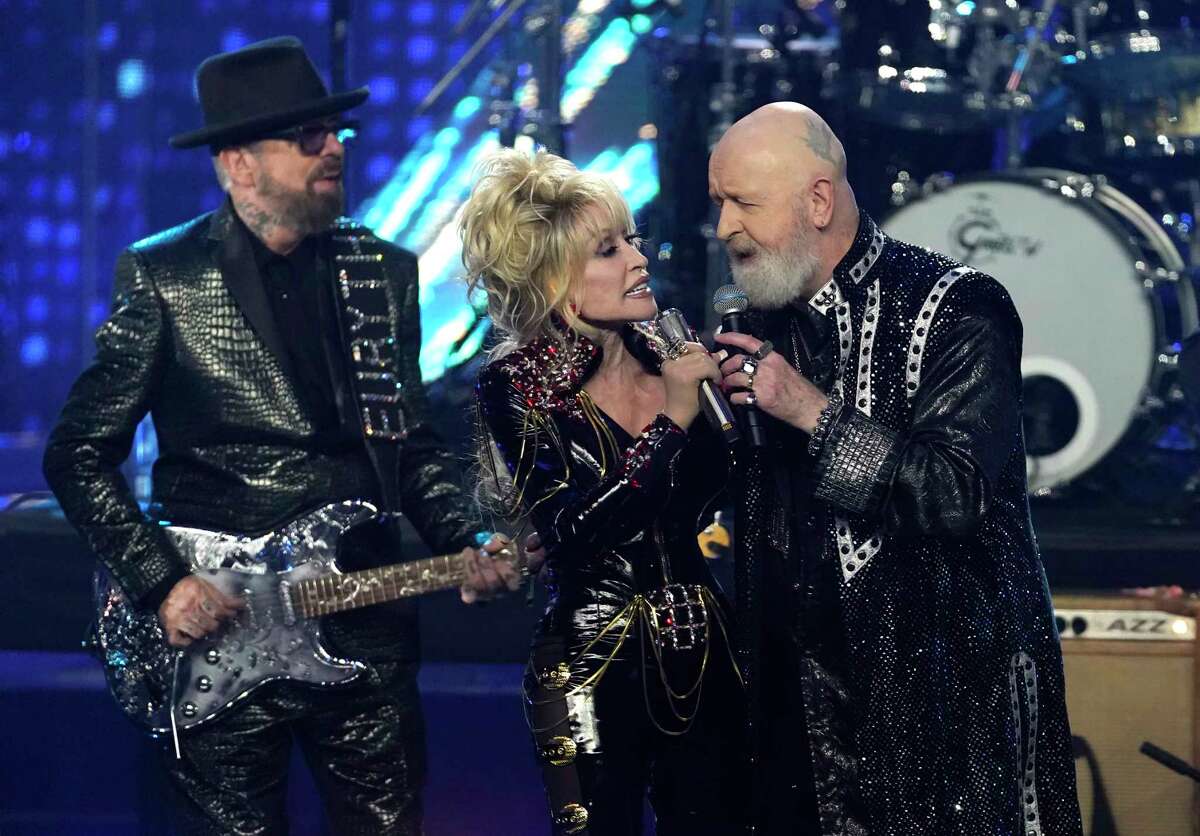 Inductees Dave Stewart of Eurythmics, from left, Dolly Parton and Rob Halford of Judas Priest perform during the Rock & Roll Hall of Fame Induction Ceremony on Saturday, Nov. 5, 2022, at the Microsoft Theater in Los Angeles.