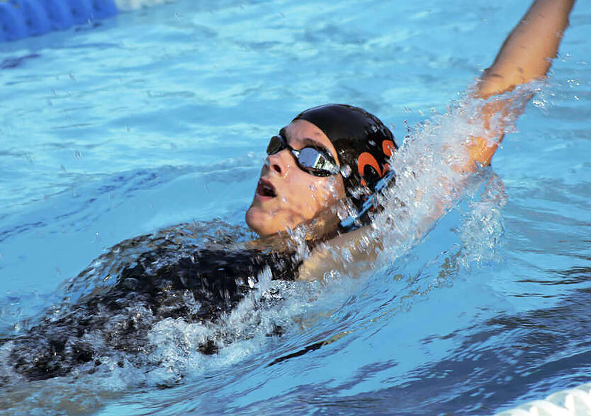 Edwardsville freshman Grace Oertle won sectional championships in the 100-yard backstroke and 50 freestyle Saturday at the IHSA Glenwood Sectional at Eisenhower Pool in Springfield. She helped lead the Tigers to the sectional team championship.