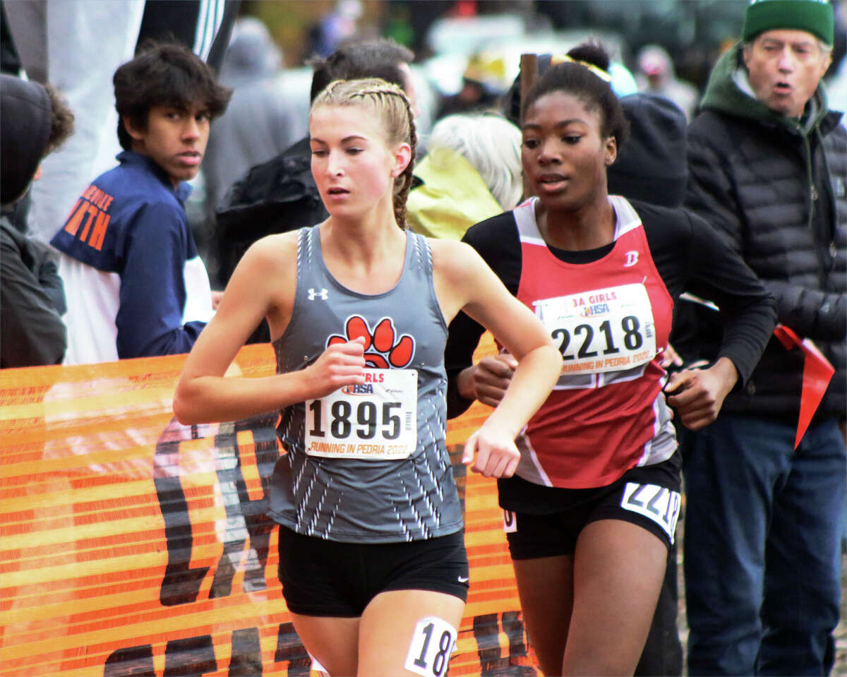 Edwardsville's Maya Lueking runs at the Class 3A cross country state meet on Saturday at Detweiller Park in Peoria.