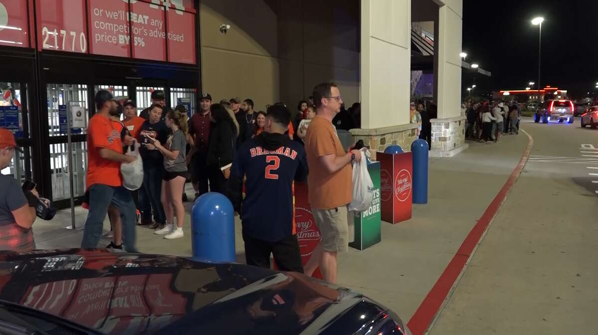 Houston Astros fans line up outside Academy to buy World Series