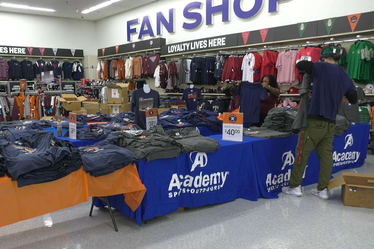 The Academy Sports + Outdoors in Kirby prepared tables full of championship gear for overnight shoppers coming into the store after the game.