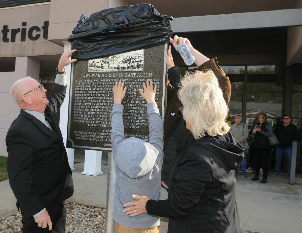 The War Horse Memorial is unveiled on Saturday at the East Alton Public Library. During World War I, the East Alton stock yards were used to house and train some 250,000 horses for the armies of Great Britain, France and Belgium. 