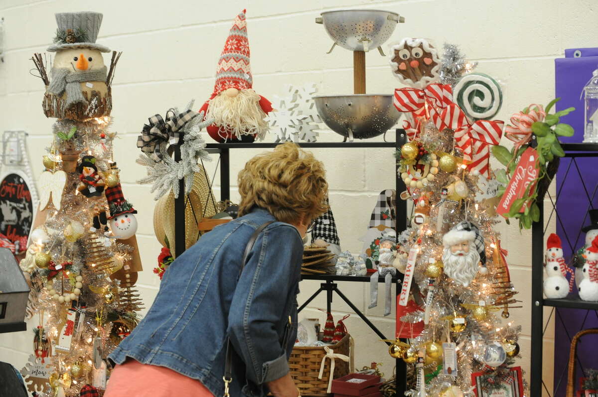 Shoppers check out items at the Deck the Walls Craft &Vendor Fair at Civic Memorial High School in Bethalto on Saturday.