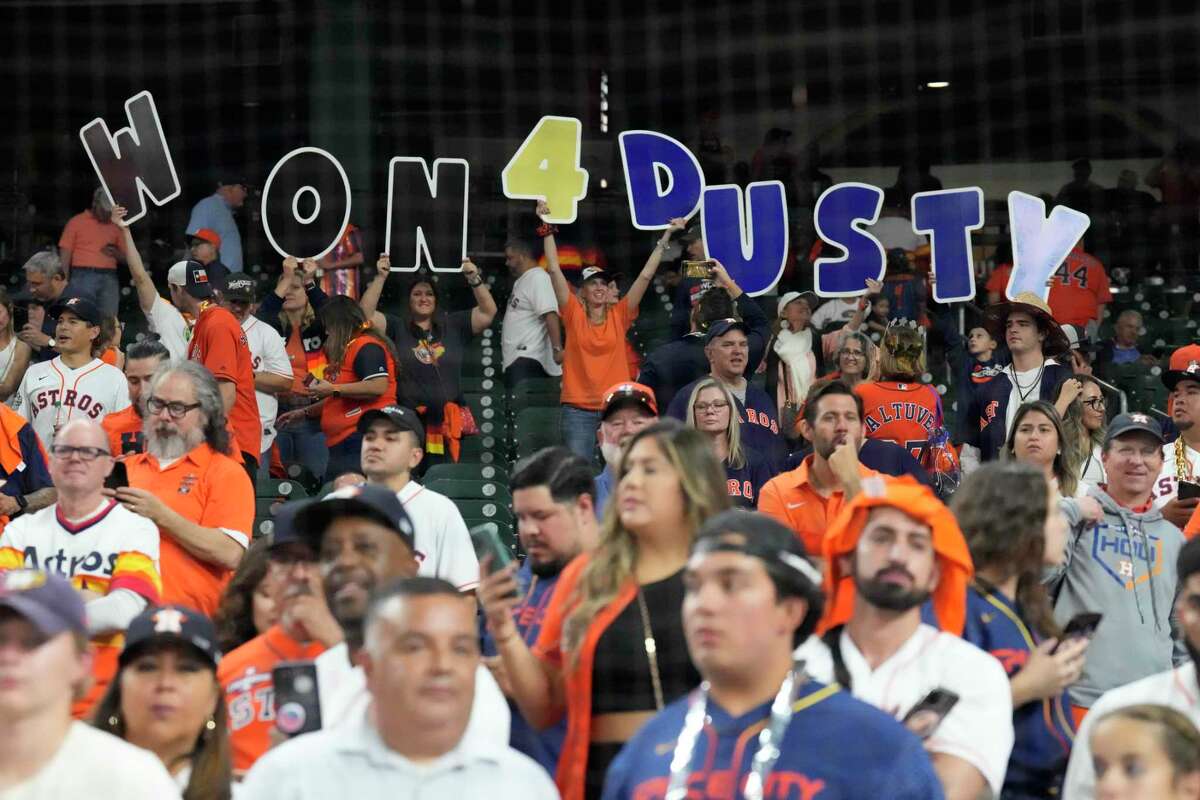 Houston fans hold up a sign for manager Dusty Baker Jr. after the Astros won the World Series over the Philadelphia Phillies at Minute Maid Park on Saturday, Nov. 5, 2022, in Houston.