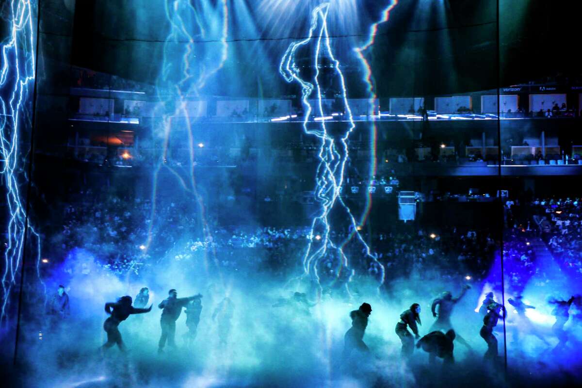 Dancers perform in the opening ceremony of the League of Legends World Championship at Chase Center in San Francisco.