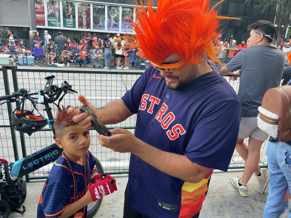 Parking garage hat toss repeats itself during 2022 Astros World Series  Parade 