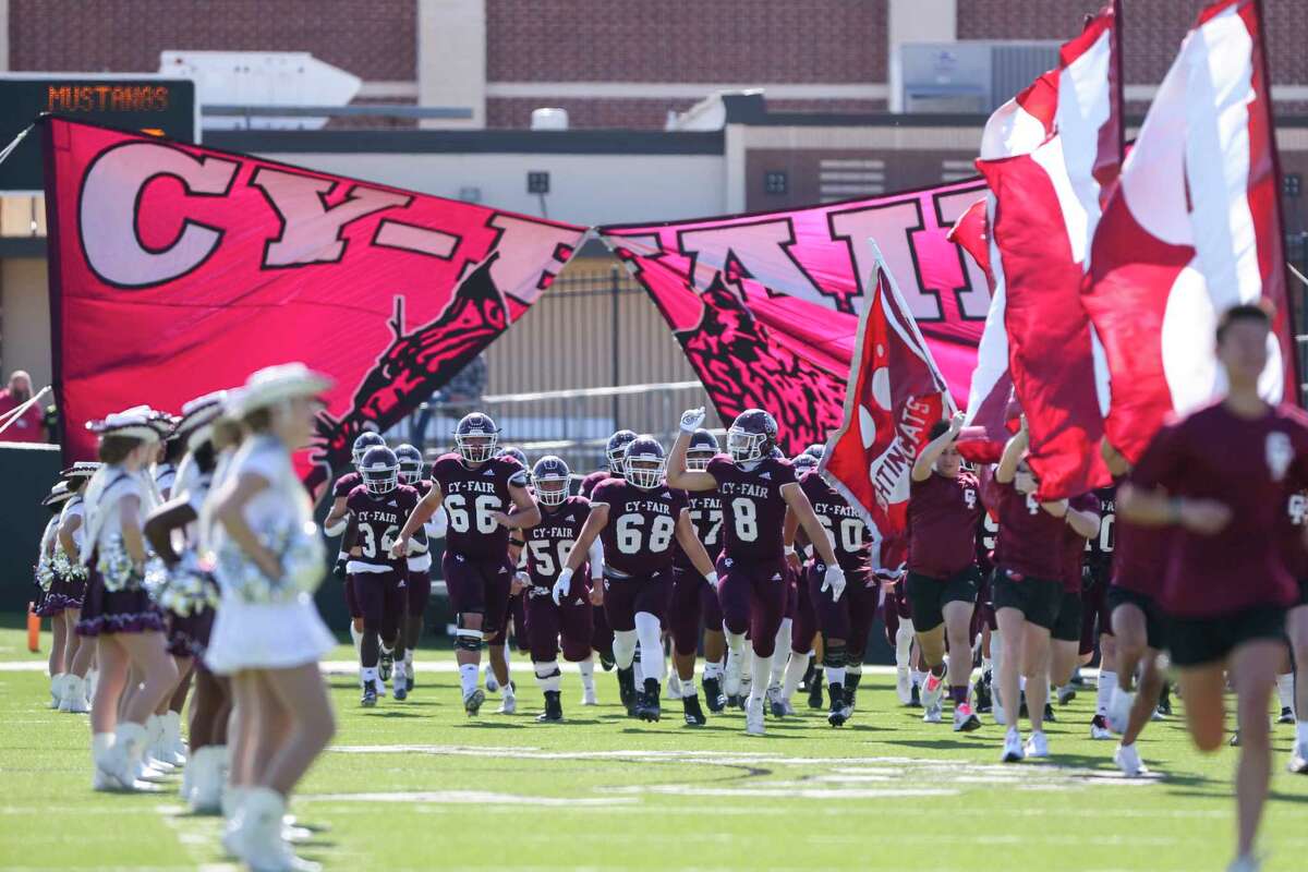 Cy-Fair Bobcats players take the field prior to a District 17-6A high school football game between the Memorial Mustangs and the Cy-Fair Bobcats at Pridgeon Stadium in Houston, TX on Saturday, November 5, 2022.