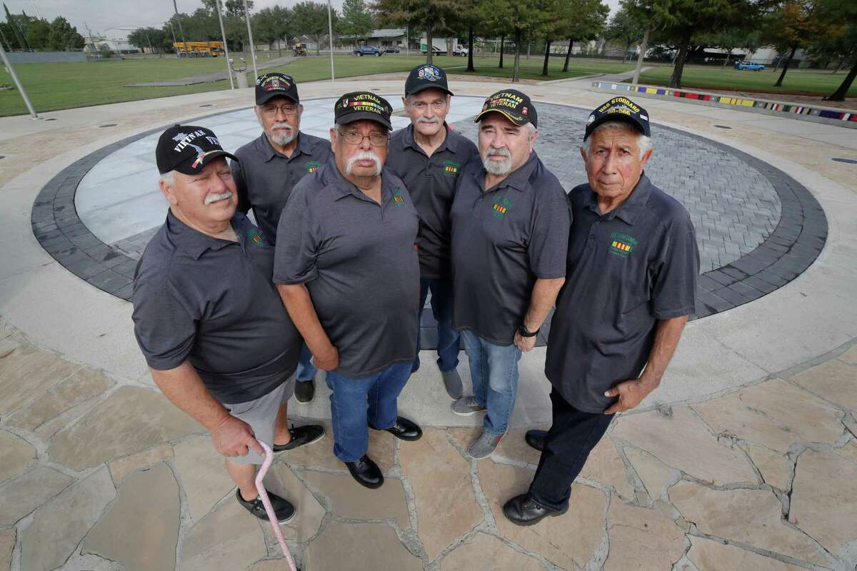 Vietnam Combat Veterans Association members, from left, Bobby Schlitzberger, Isidro Rojas Jr., Winslow “Ben” Gutierrez, Dennis Loop, David Ramos and Diego Tristan at the site of the memorial, still under construction, that they have worked on for over a decade to install at Veterans Memorial Park Monday, Nov. 7, 2022 in Houston, TX.