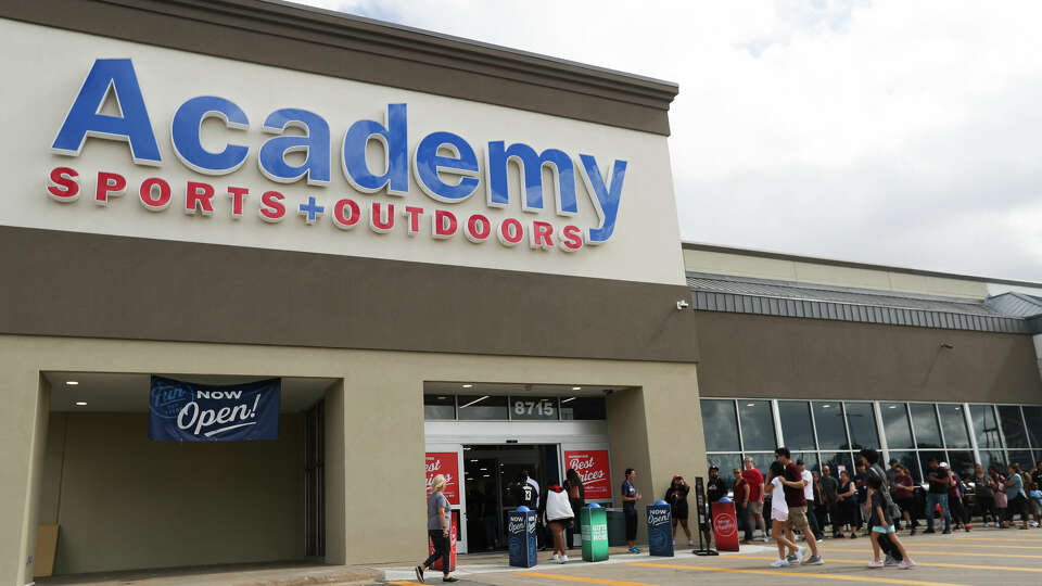 Astros fans line up to shop for World Series championship apparel at Academy Sports & Outdoors, Sunday, Nov. 6, 2022, in Houston.