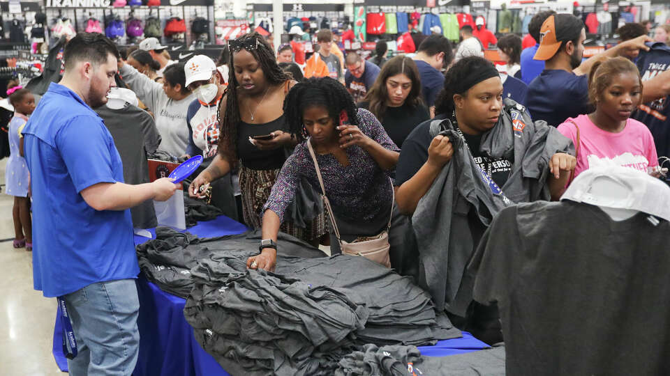 Astros fans shop for World Series championship apparel at Academy Sports & Outdoors, Sunday, Nov. 6, 2022, in Houston.