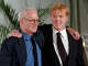 Prolific actors Paul Newman, left, and Robert Redford pose for photos arm in arm during the 2004 Westport Country Playhouse gala in Greenwich.