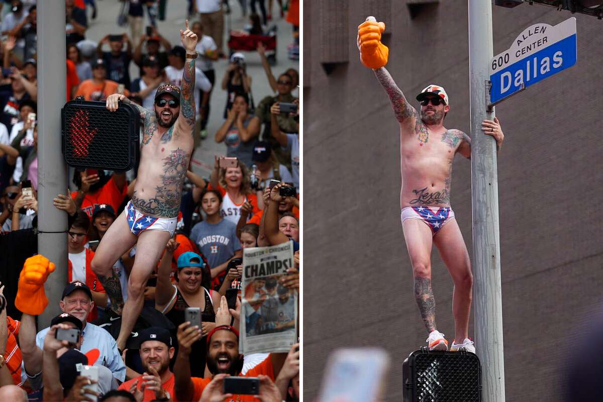 Ronnie Baker replicated his performance from the 2017 Astros parade (left) by donning the same Evel Knievel Speedo and climbing another street pole at the Astros parade on Monday, Nov. 7, 2022.