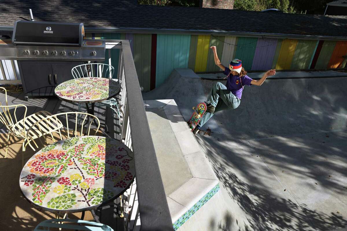 Minna Stess, a 16-year-old Olympic hopeful skateboarder, practices on the backyard skatepark at her family’s home in Petaluma, Calif., on Tuesday, September 27, 2022.