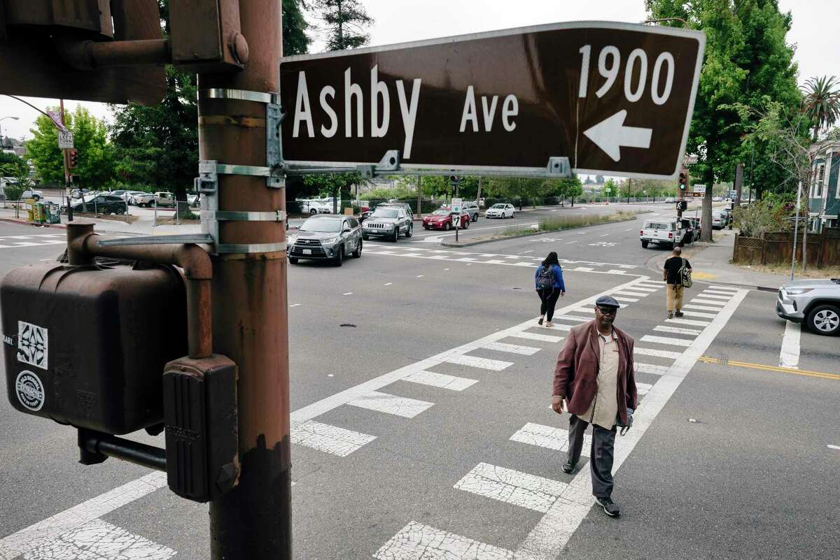 Pedestrians use the crosswalk on Martin Luther King Jr. Way as they cross Ashby Avenue in Berkeley, Calif., on Thursday, August 22, 2019.