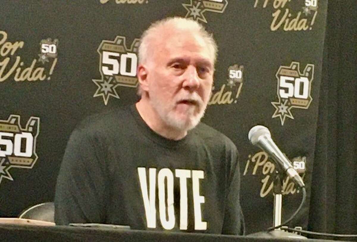 Spurs coach Gregg Popovich wearing a VOTE T-shirt at the AT&T Center on Monday, Nov. 7, 2002, the day before Election Day.