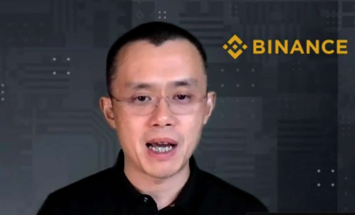 FILE - Binance CEO Changpeng Zhao answers a question during a Zoom meeting interview with The Associated Press on Nov. 16, 2021. The cryptocurrency exchange Binance said it plans to buy its rival FTX Trading, in what appears to be a bailout of FTX.