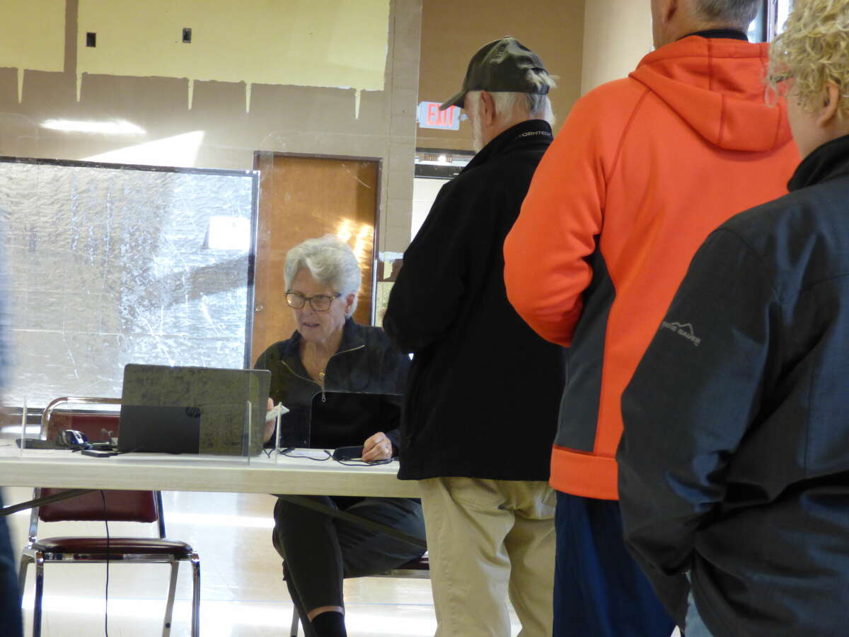 Manistee residents line up to receive their ballots at the Wagoner Community Center on Nov. 8, 2022. 