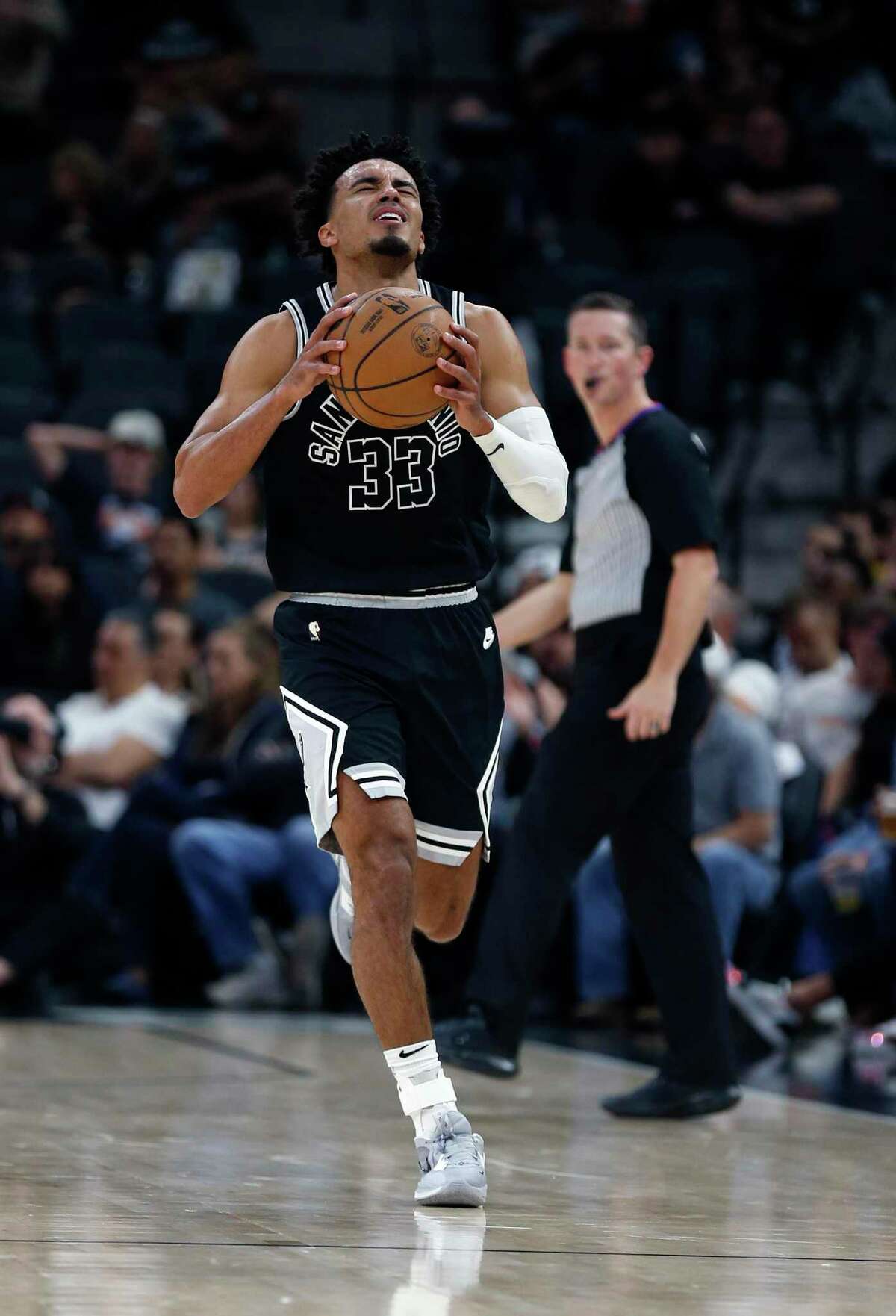 San Antonio Spurs Tre Jones #33 (33) reacts after a turnover against the Denver Nuggets in the first half on Monday, Nov. 7, 2022 at AT&T Center