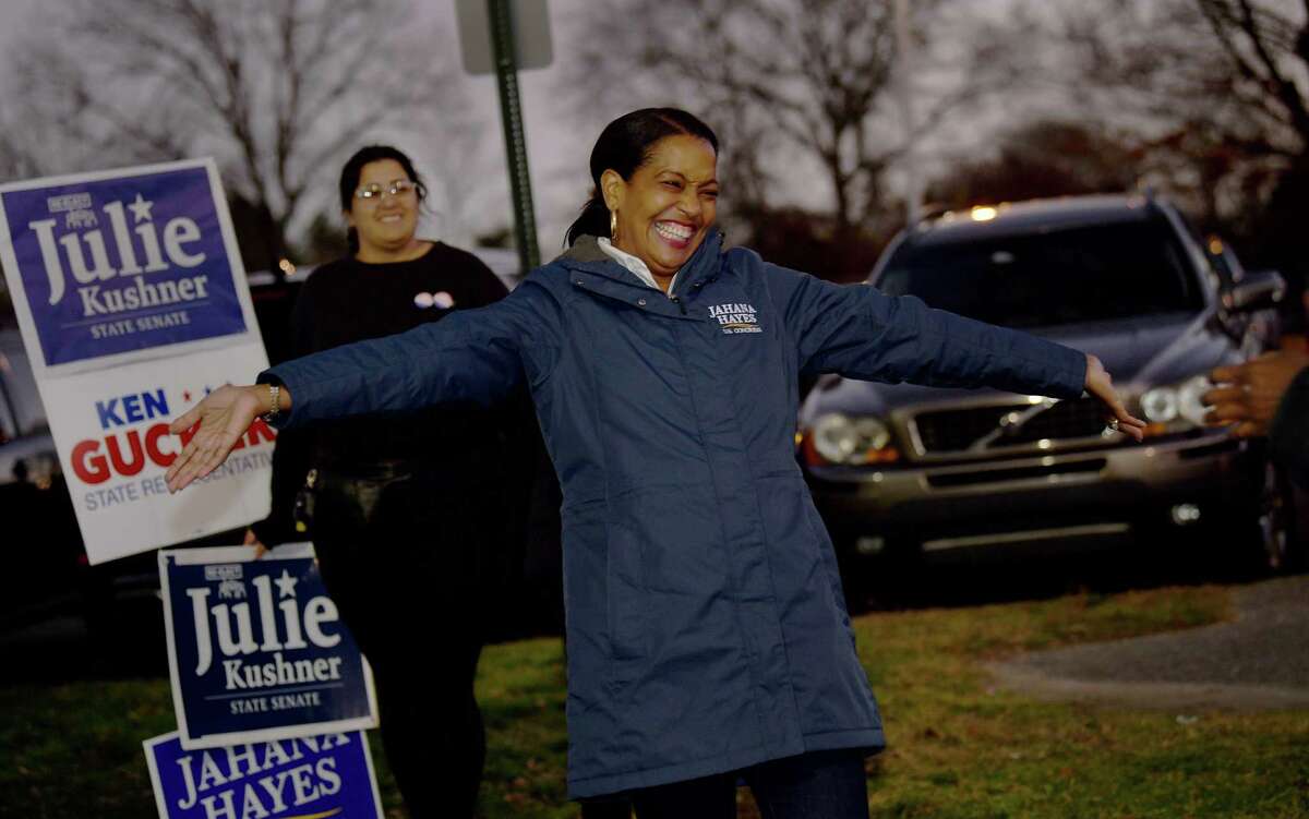 Incumbant Democratic 5th District Congresswoman Jahana Hayes extends her arms in greeting to a supporter during a campaign stop at the Danbury High School Election Day, Tuesday, Nov. 8, 2022.