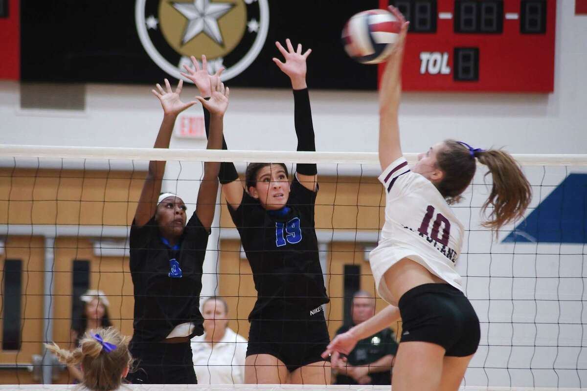 Clear Springs’ Myah Griggs (9) and Clear Springs’ Anzley Rinard (19) try to block a shot by Pearland’s Madie Whitehead (10) Tuesday, Nov. 8, 2022 at Clear Lake High School.