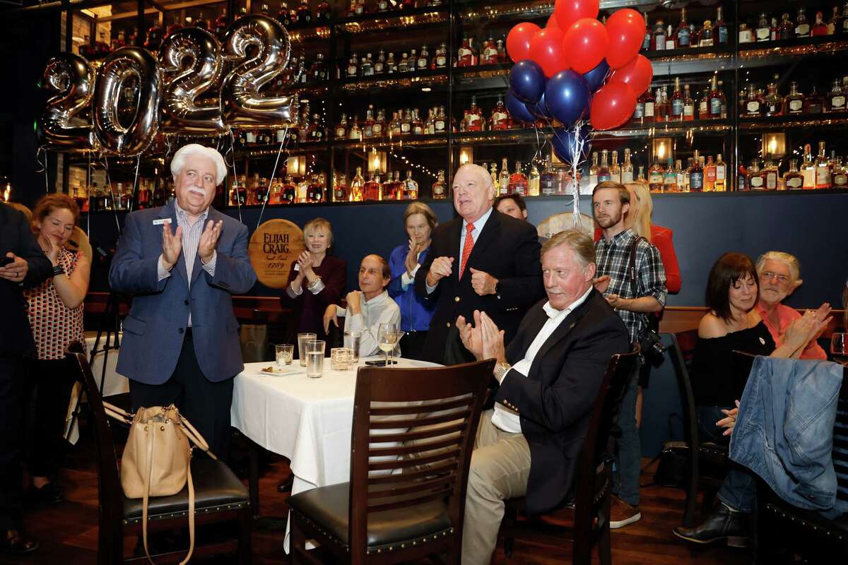 Former Harris County Clerk Stan Stanart applauds during the Harris County GOP's election night party at the Federal Grill in Houston, TX on Tuesday, November 8, 2022. Stanart was defeated by incumbent Harris County Clerk Teneshia Hudspeth.