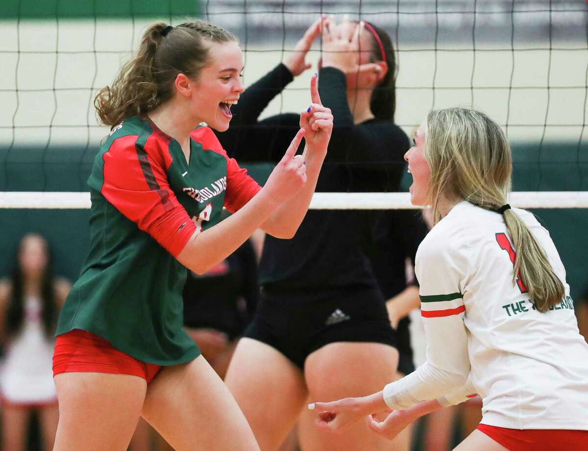 Shown here earlier this week, The Woodlands outside hitter Makenzie Weddel (8) and libero Molly Tuozzo (12) are heading to the Region II-6A championship on Saturday after knocking off Waxahachie in five sets on Friday in Lufkin.