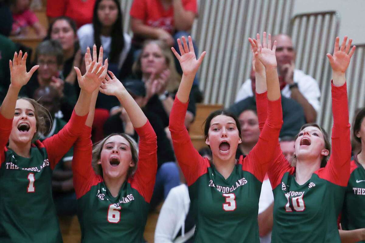 The Woodlands celebrates a point in the fifth set during a Region II-6A quarterfinal volleyball match at The Woodlands High School, Tuesday, Nov. 8, 2022, in The Woodlands.