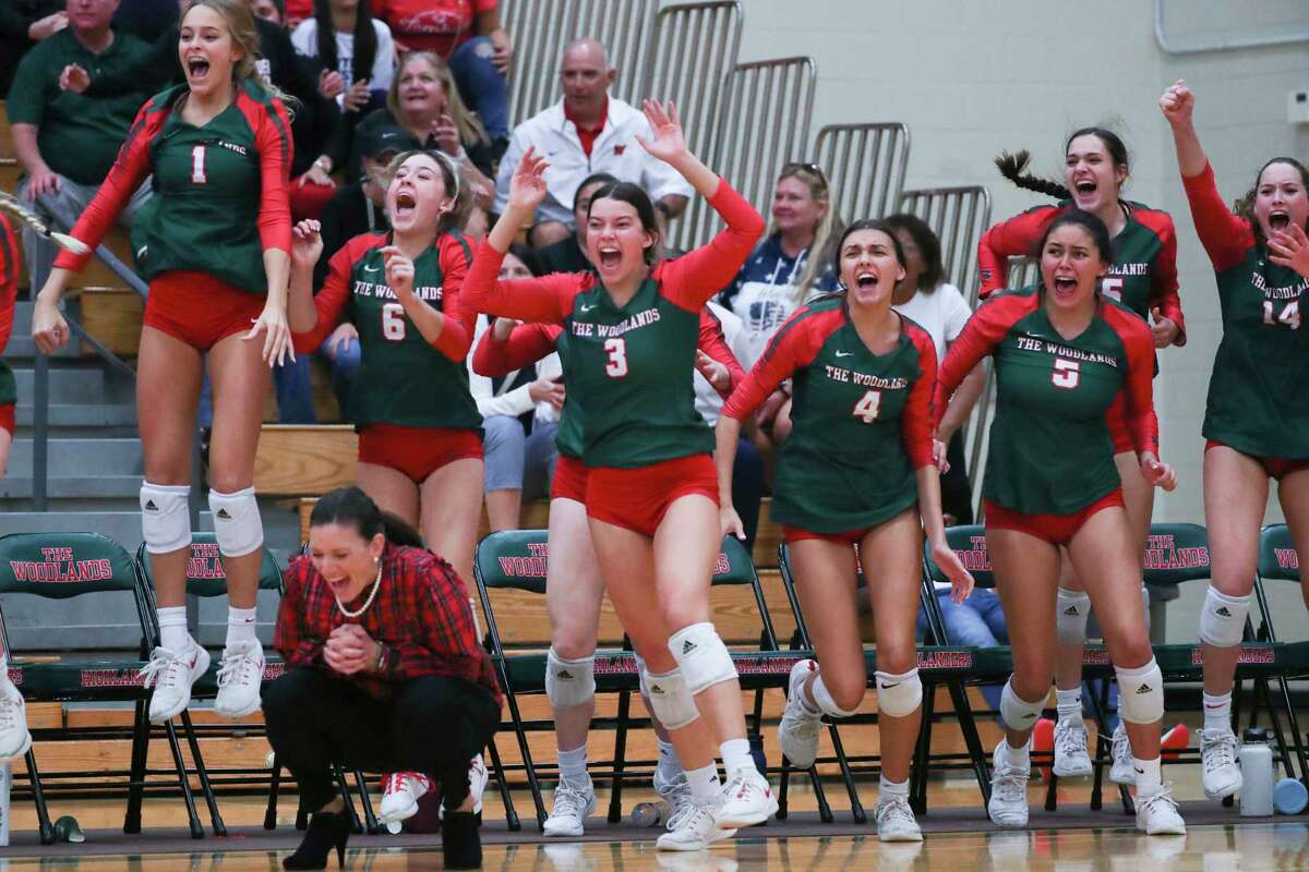 The Woodlands reacts after defeating Tomball in five sets during a Region II-6A quarterfinal volleyball match at The Woodlands High School, Tuesday, Nov. 8, 2022, in The Woodlands.