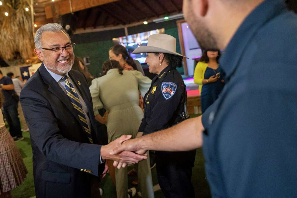 Incumbent Bexar County District Attorney Joe Gonzales greets a supporter during his campaign party at Backyard on Broadway in San Antonio on Nov. 8, 2022.