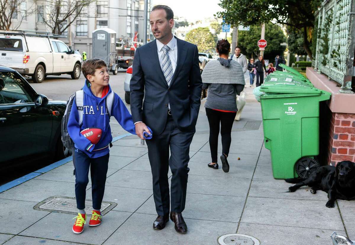 San Francisco District Attorney candidate Joe Alioto Veronese is shown walking his son, Augustus Alioto Veronese, to school in 2019.