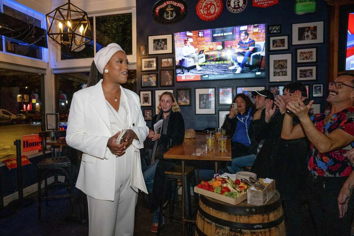 Honey Mahogany enters the Trademark Sports Bar to cheers from her supporters in San Francisco, Calif. on Saturday, November 8, 2022.