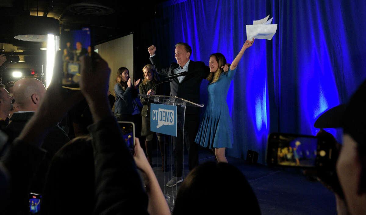 Gov. Ned Lamont celebrates his election win with Lt. Gov. Susan Bysiewicz in front of the crowds gathered at the Democratâs election night gathering, Dunkin' Donuts Park, Hartford, Conn. Tuesday night, November 7, 2022.