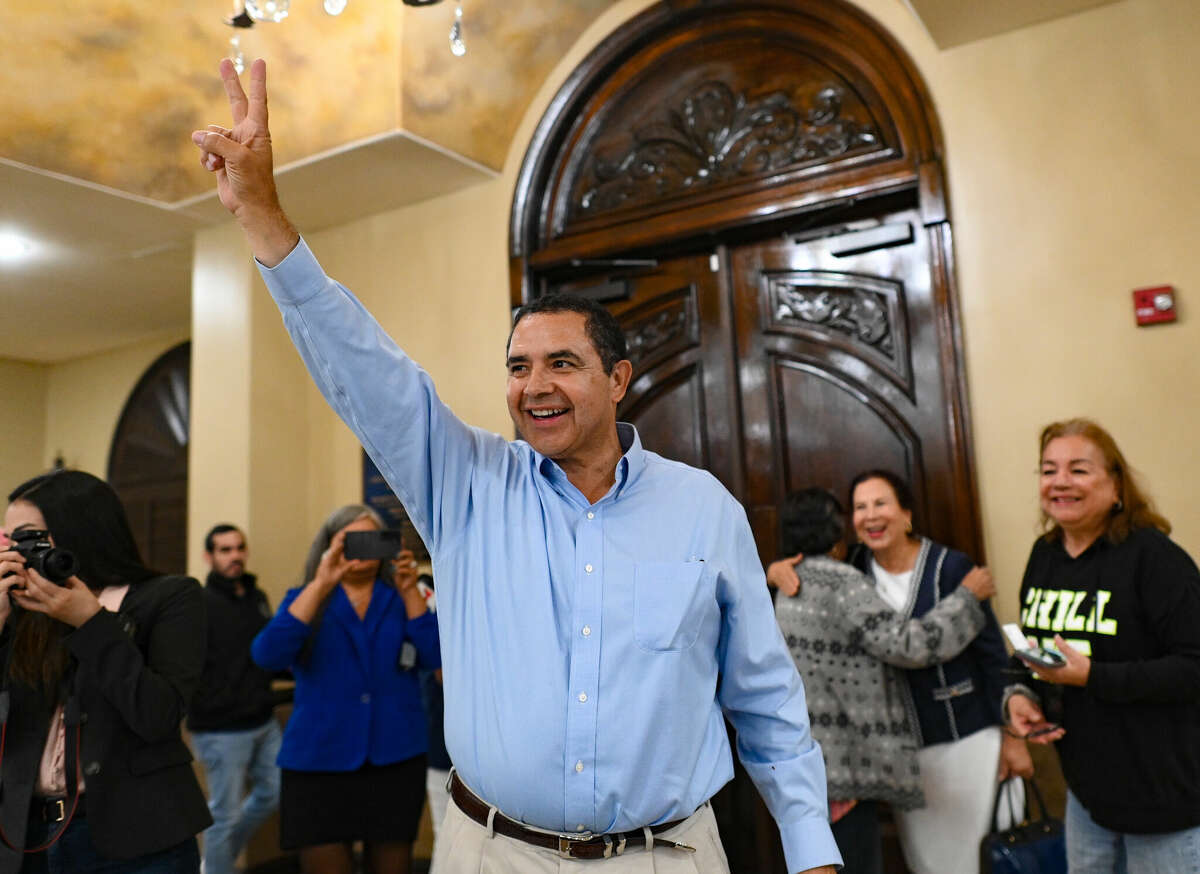 Incumbent Democrat Henry Cuellar arrives at his watch party in Laredo as he leads Republican challenger Cassy Garcia in the Texas 28th Congressional District race on Tuesday, Nov. 8, 2022.