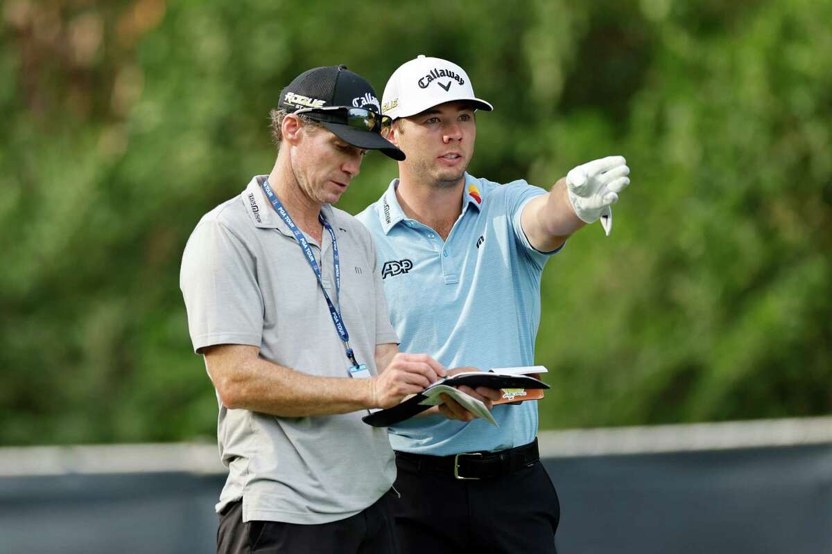 Sam Burns chats with his caddy on the eighth tee during the Houston Open Pro-Am at Memorial Park Golf Course in Houston, TX on Wednesday, November 9, 2022.