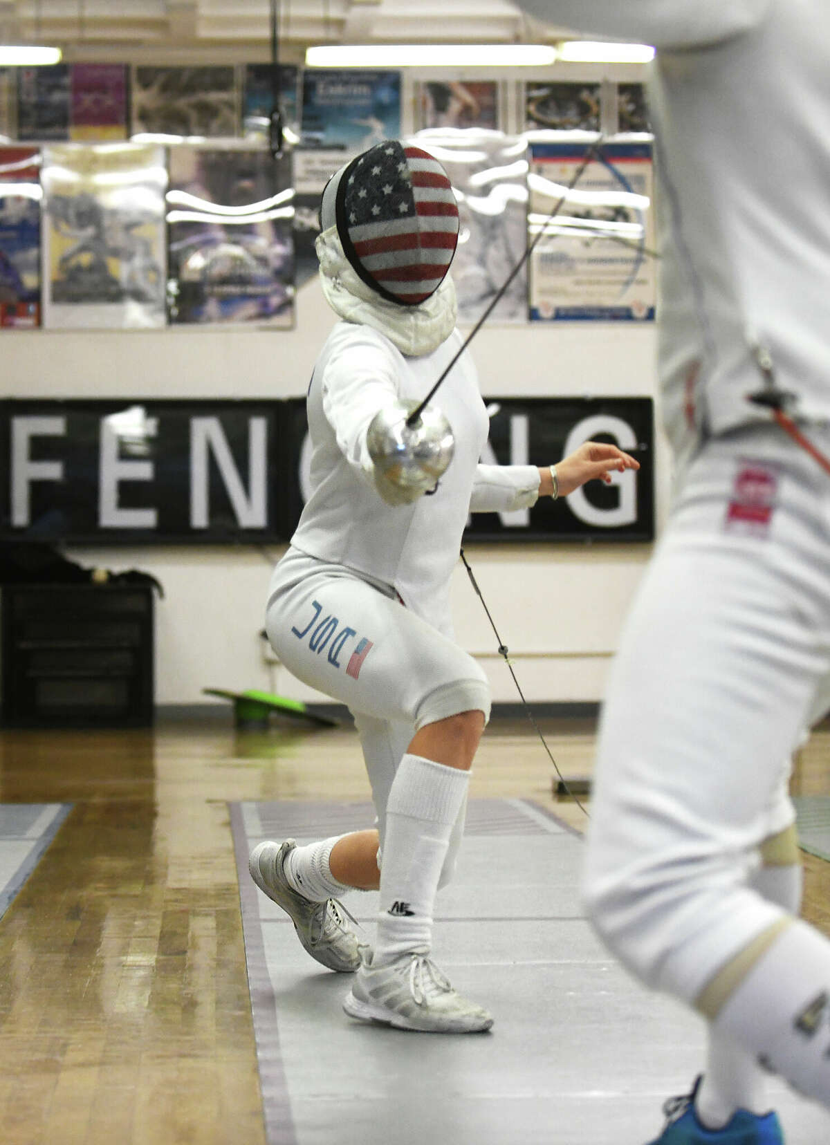 Greenwich teen lunges toward dreams of college, Olympic fencing