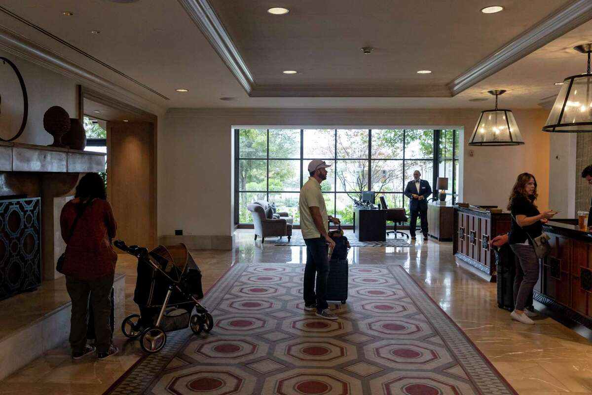 Guests line up to check in at La Cantera Resort & Spa on Nov. 2, 2022.