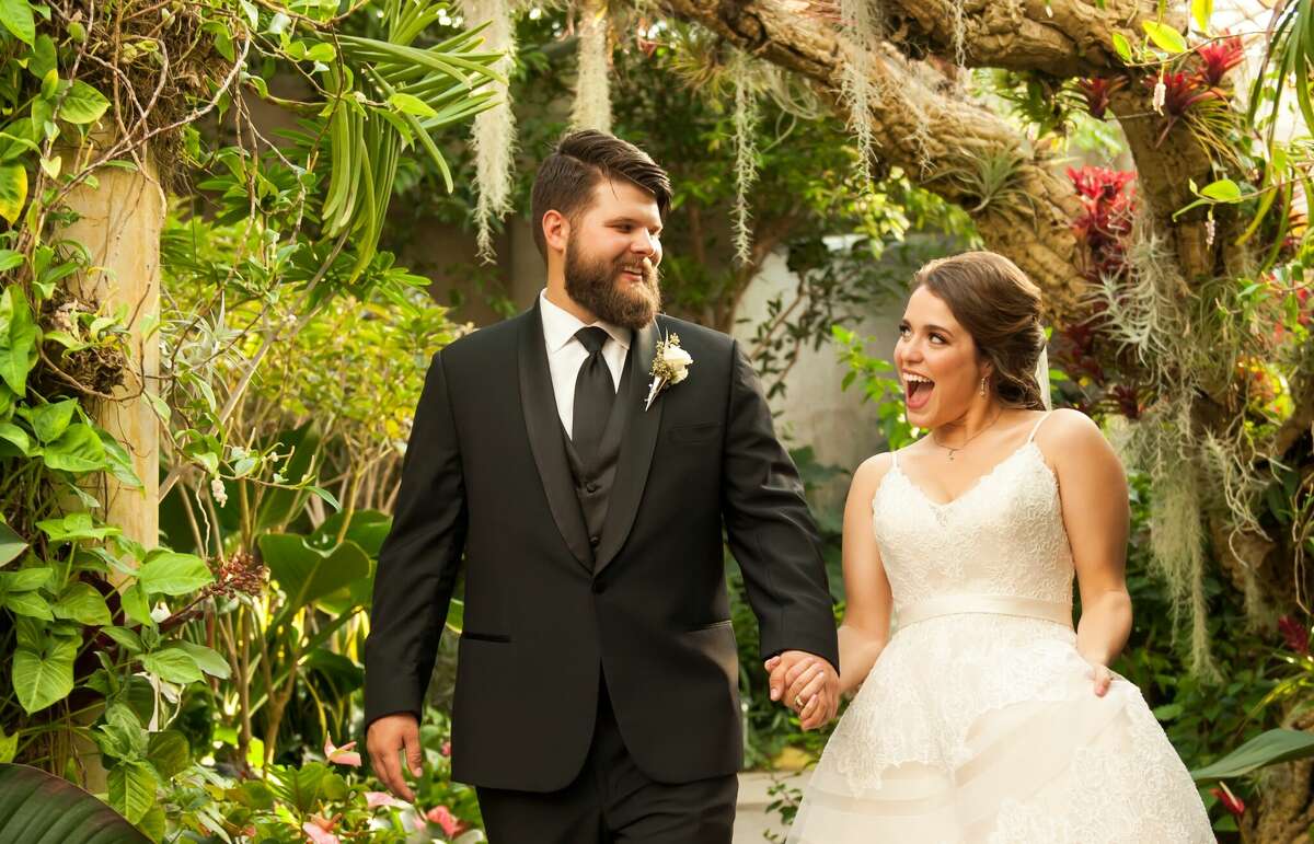 The Lucile Halsel Conservatory at the San Antonio Botanical Garden is a popular spot for San Antoio couples seeking a unique place for their weddings and wedding photos.